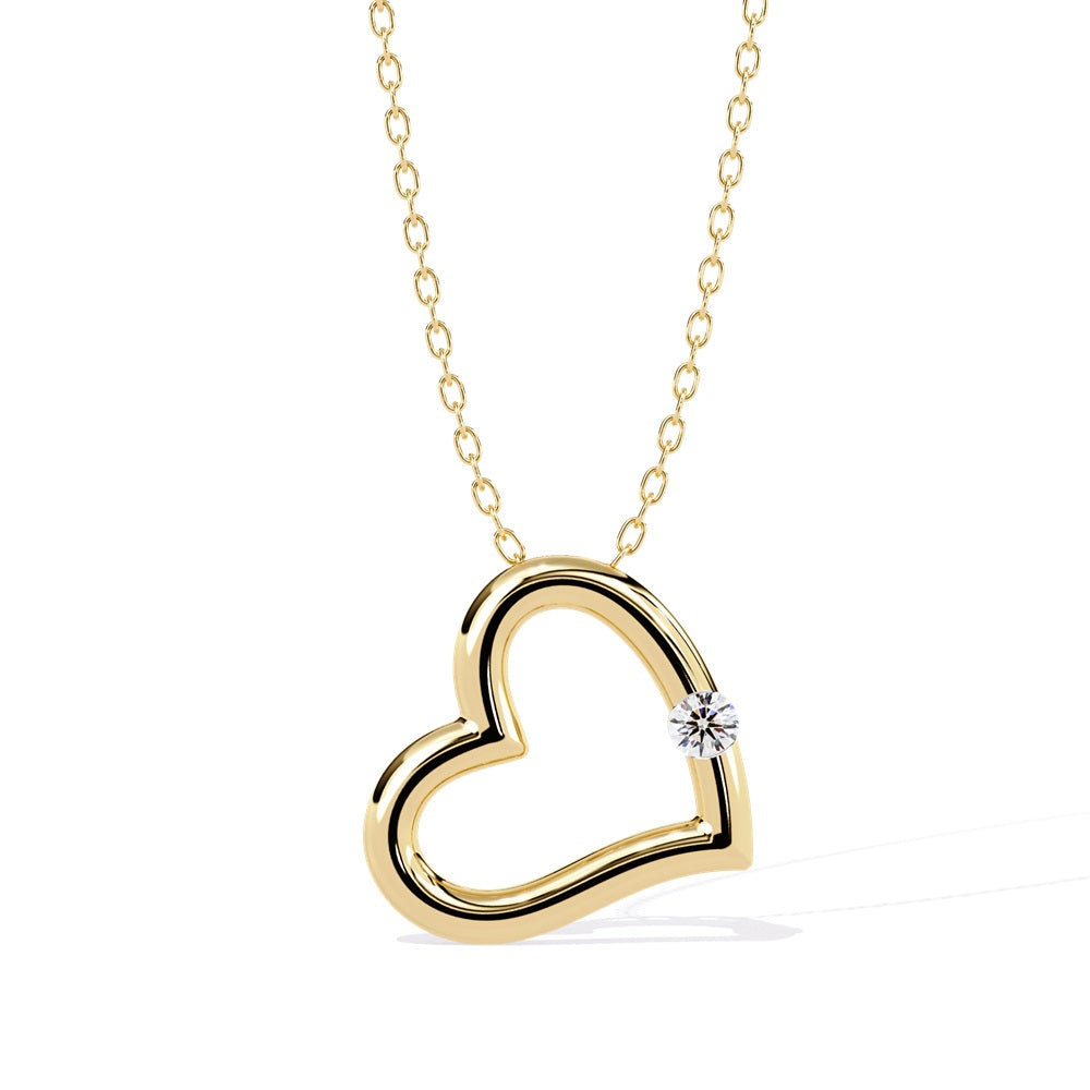 Gold necklace featuring an open heart-shaped pendant with a single small diamond attached to one side.