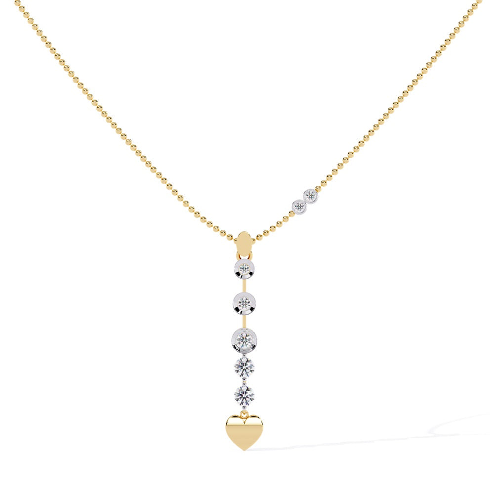 The Exquisite Heart Diamond Pendant by Niraa is a delicate gold necklace with a vertical pendant adorned with shimmering round diamonds and a charming gold heart at the bottom. The chain, featuring tiny diamond accents, exudes elegance.
