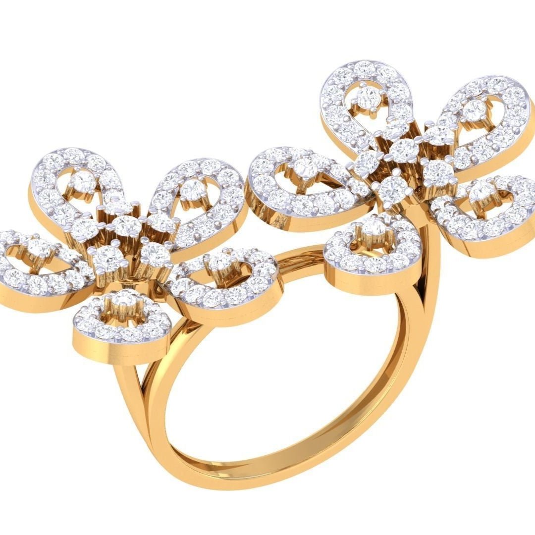 Introducing the Eden Diamond Ladies Ring by Niraa: a luxurious gold ring featuring two butterfly designs embellished with sparkling white diamonds, symmetrically arranged on the band, and wings detailed in embedded diamonds for an elegant appearance.